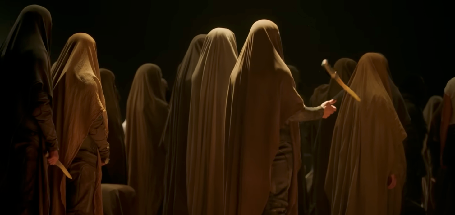 IMAGE: Women worshipping in a cave in the desert - Costume Design by Jacqueline West - Warner Bros Entertainment - DUNE 3